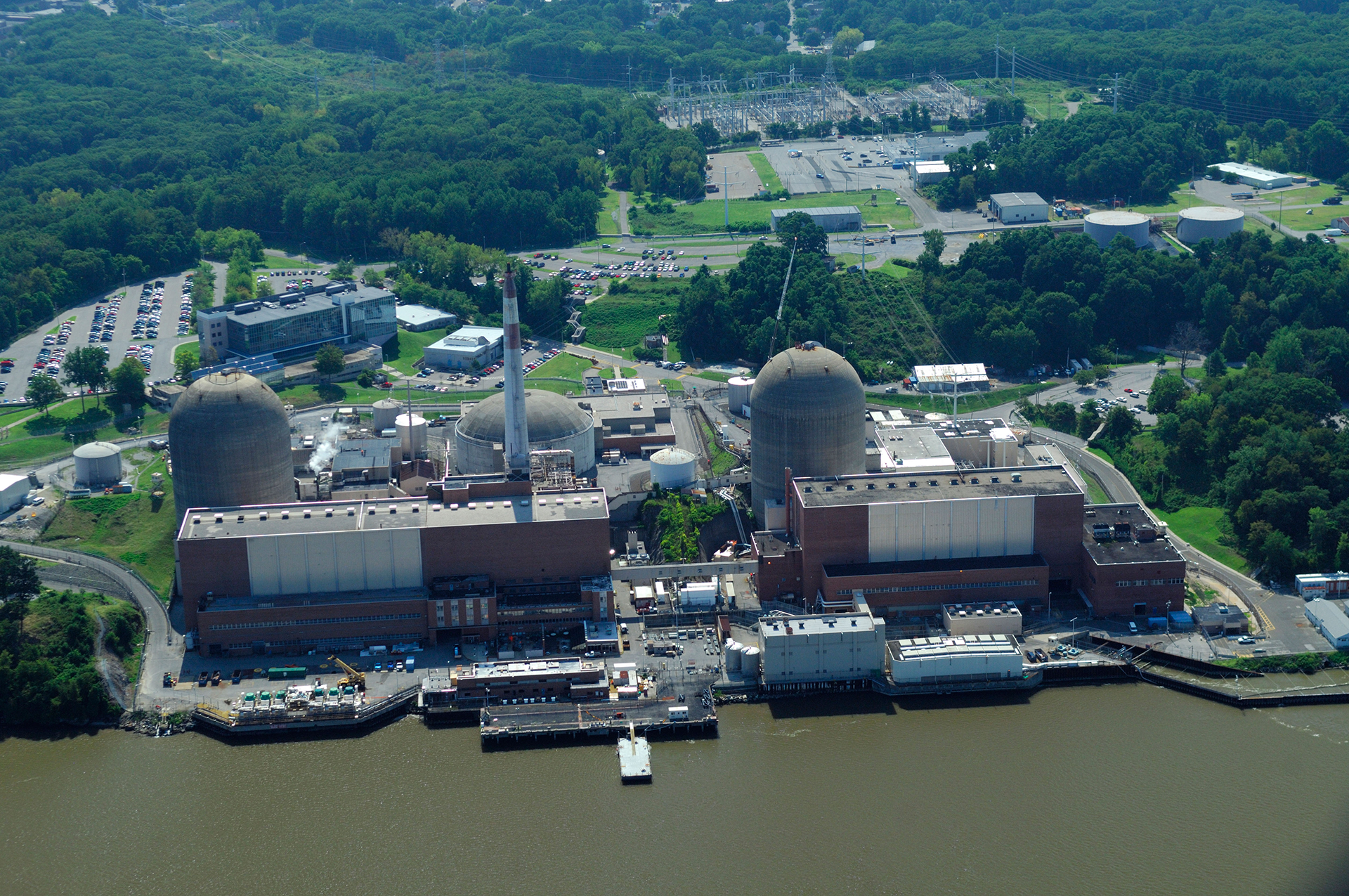 Aerial view of nuclear power plant beside a river