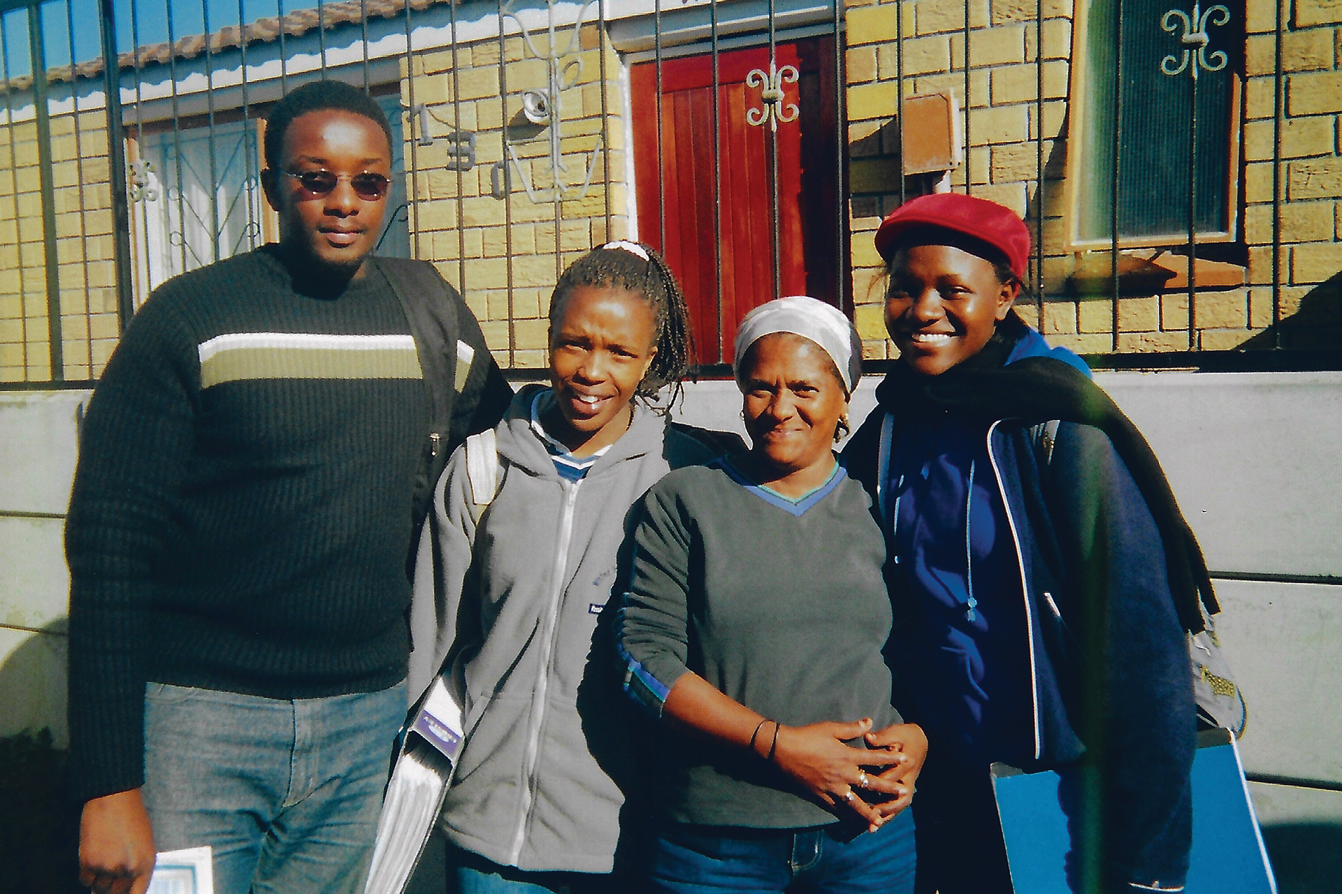 https://www.aap.cornell.edu/Students%20and%20community%20members%20posed%20in%20a%20South%20African%20street
