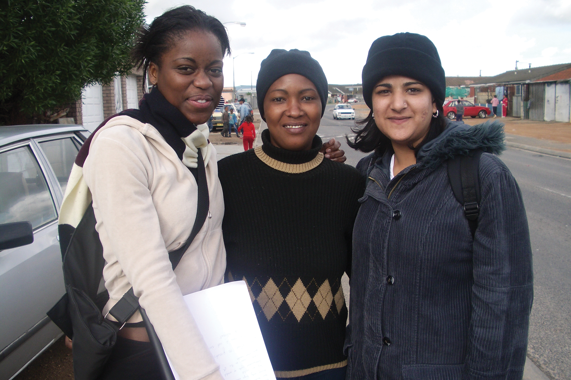 https://www.aap.cornell.edu/Students%20and%20community%20members%20posed%20in%20a%20South%20African%20street