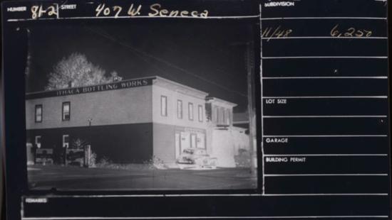 A rectangular brick building labeled 