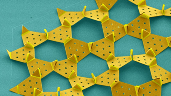 microscopic metal machine parts on a blue background