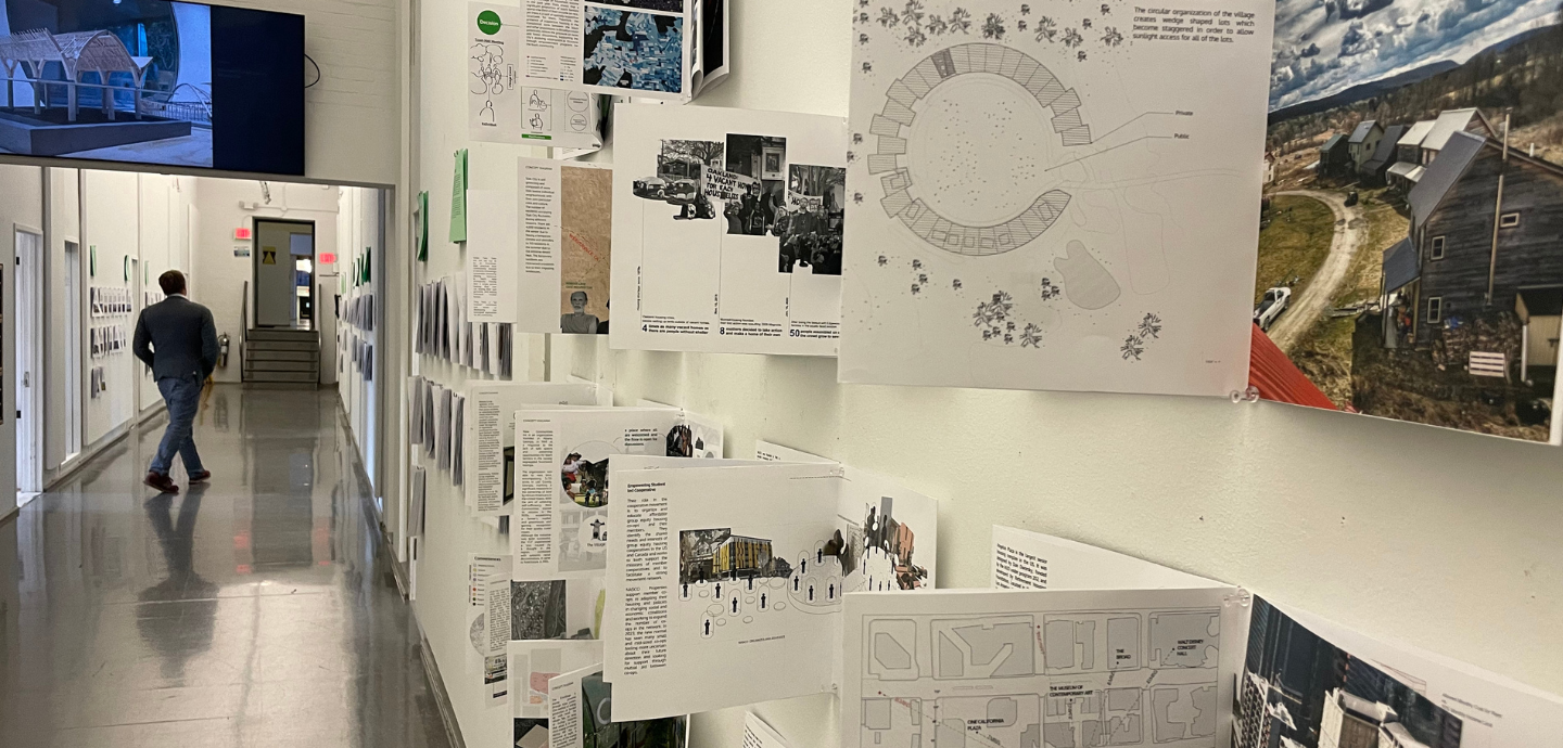 A hallway with brochures on the walls