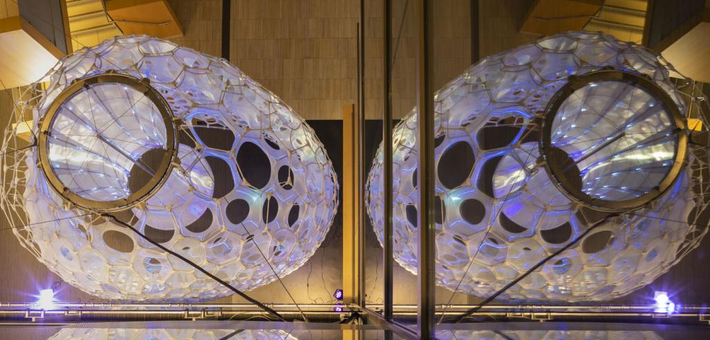 a large structure with responsive digitally knit textiles processed through artificial intelligence algorithms and affective computing