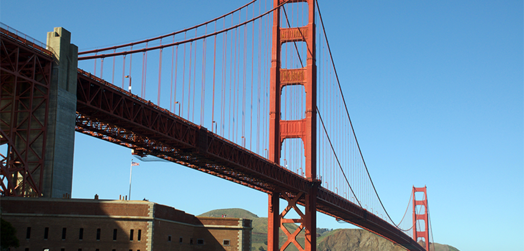 A large orange bringe with a blue sky in the background.