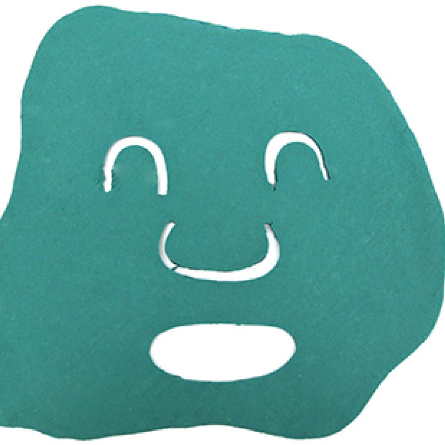 Teal paper cutout in the shape of a face mask on a white background. 