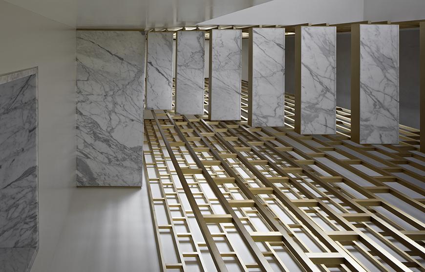 whote marble room with raised rectangular flooring