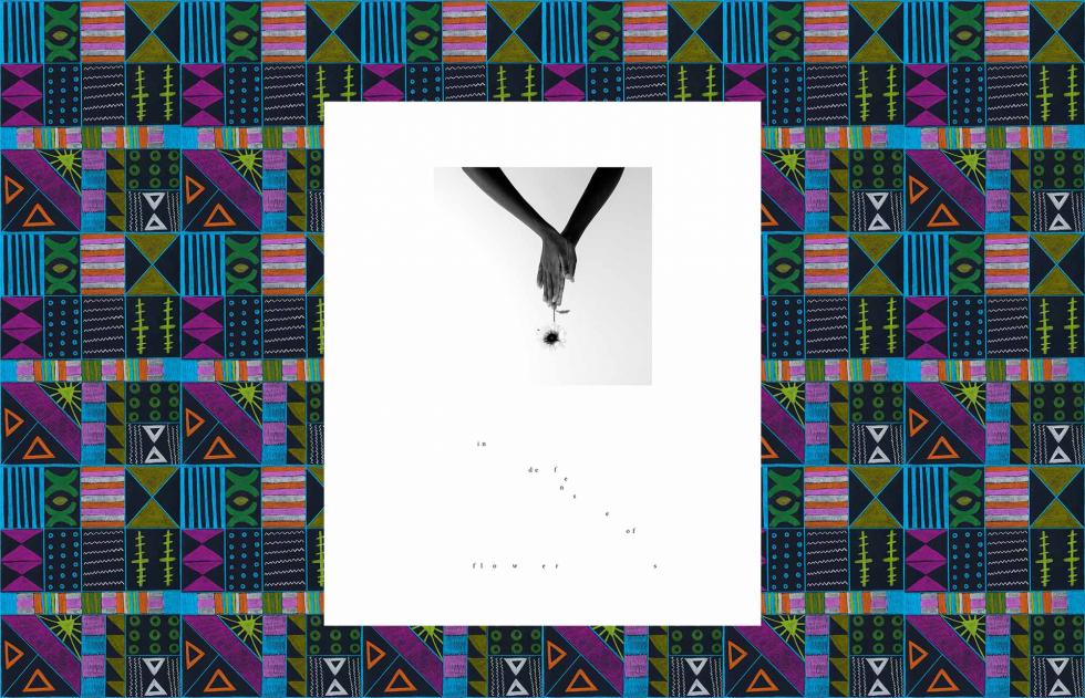 Colorful patterned background with pink, purple, green, blue, and black behind a white and black image of two hands clasped together holding an object.