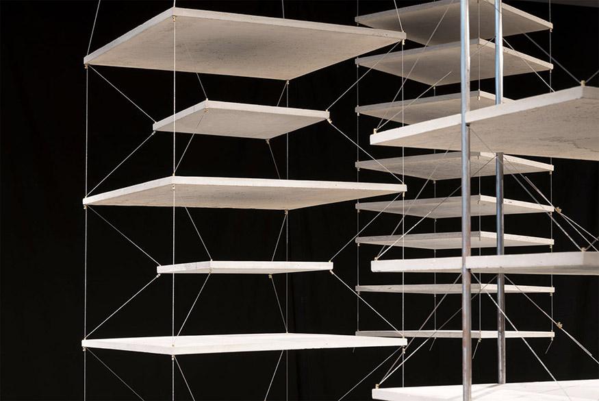 Digital rendering of an architectural model against a black background. 