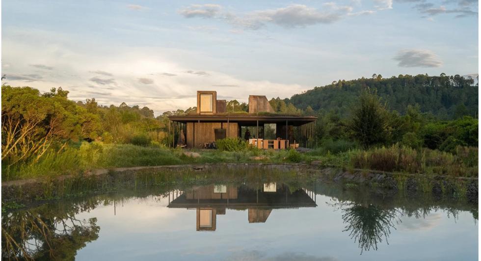 a photo of a house on a lake