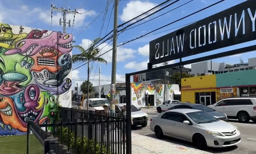 https://www.aap.cornell.edu/A%20street%20scene%20with%20a%20mural%2C%20cars%2C%20and%20a%20Wynwood%20Walls%20entry%20sign